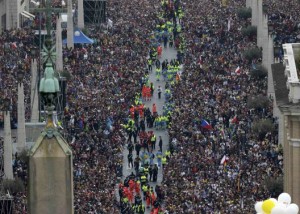 Catholic faithful on Via della Conciliazione attend the canonisation ceremony of Popes John XXIII and John Paul II in St Peter's Square at the Vatican